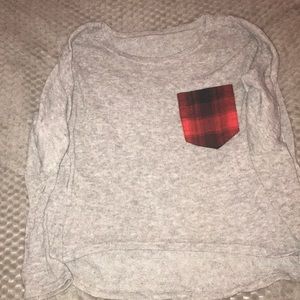 Gray sweater.